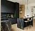 Элитная угловая чёрная кухня с барной стойкой