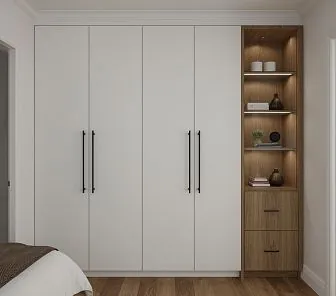 Шкаф с гладкими матовыми белыми фасадами и черными ручками