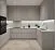 U-образная кухня в светло-сером матовом оттенке